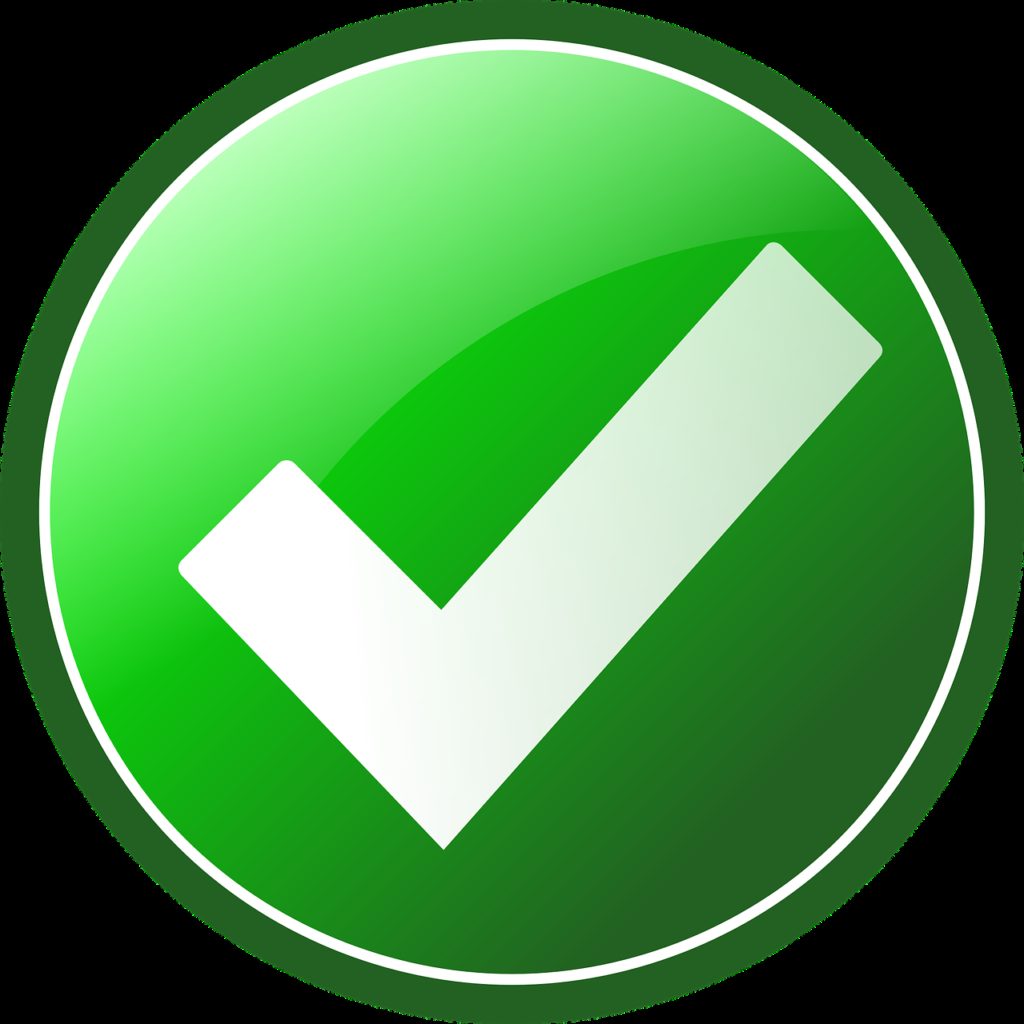 white checkmark in green circle with black background
