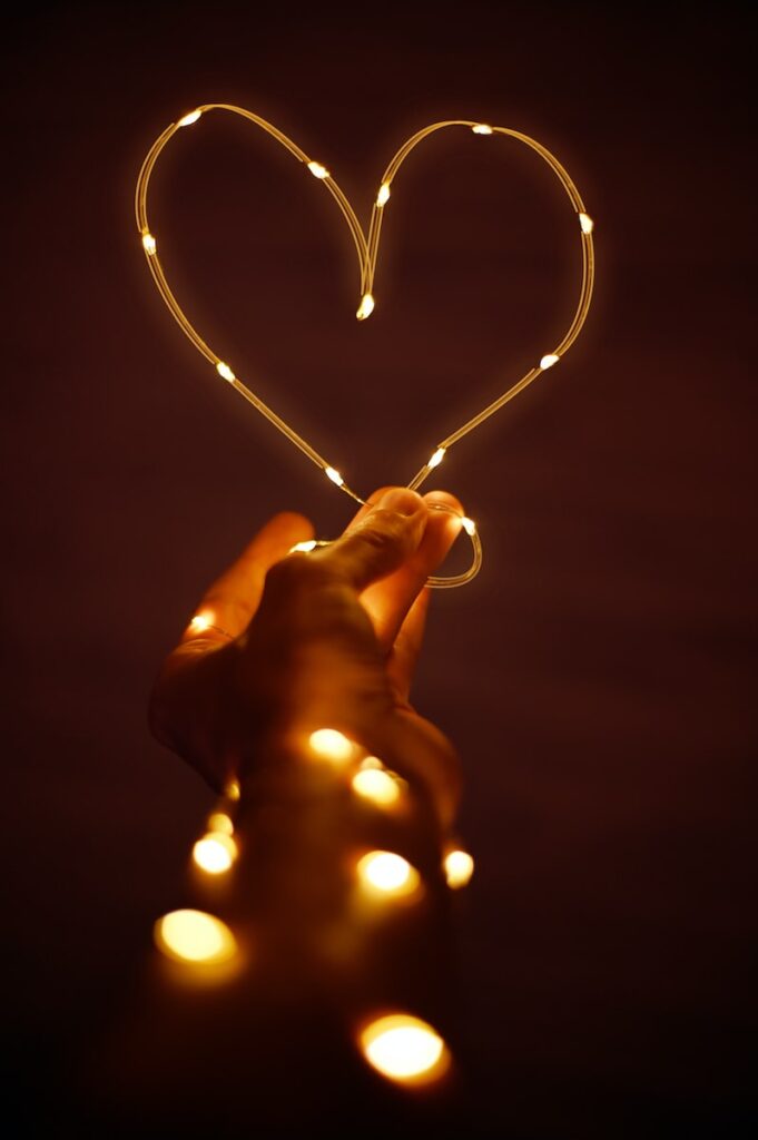 orange string light in the shape of a heart